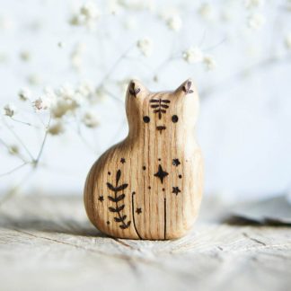 Cat sitting wooden toy