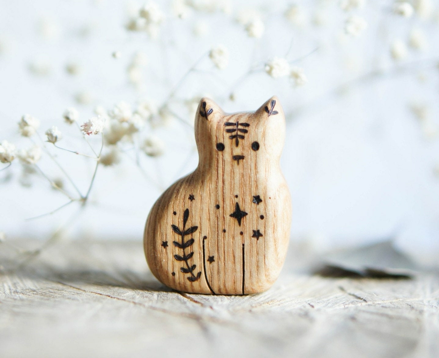 Cat sitting wooden toy