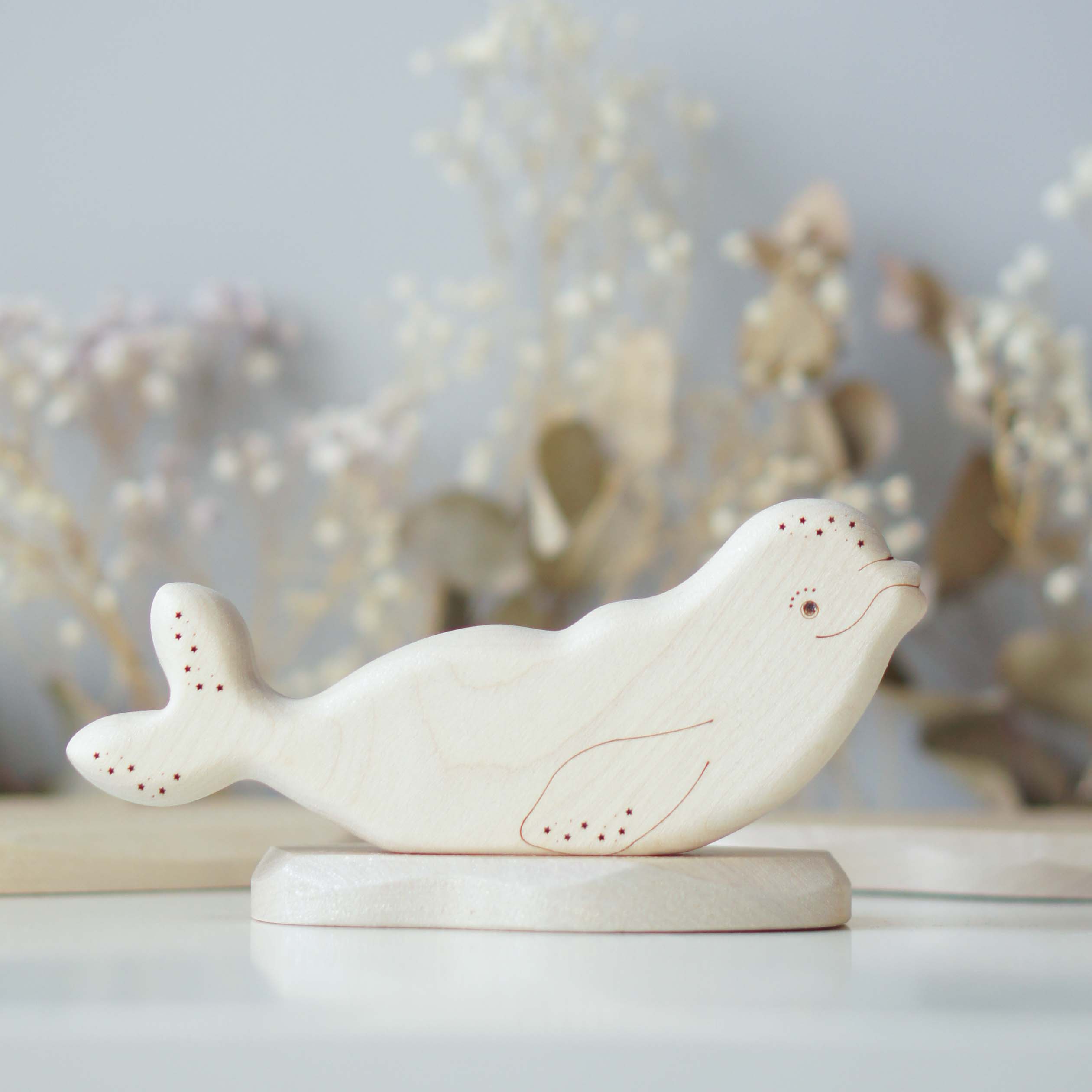 Beluga whale mom with sparkle - back view