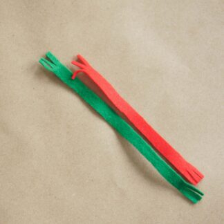Two felt toy scarves, one red and one green