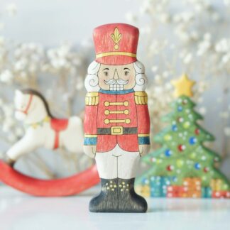 Nutcracker in red uniform - front view