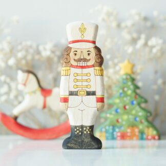 Nutcracker in ivory uniform - front view