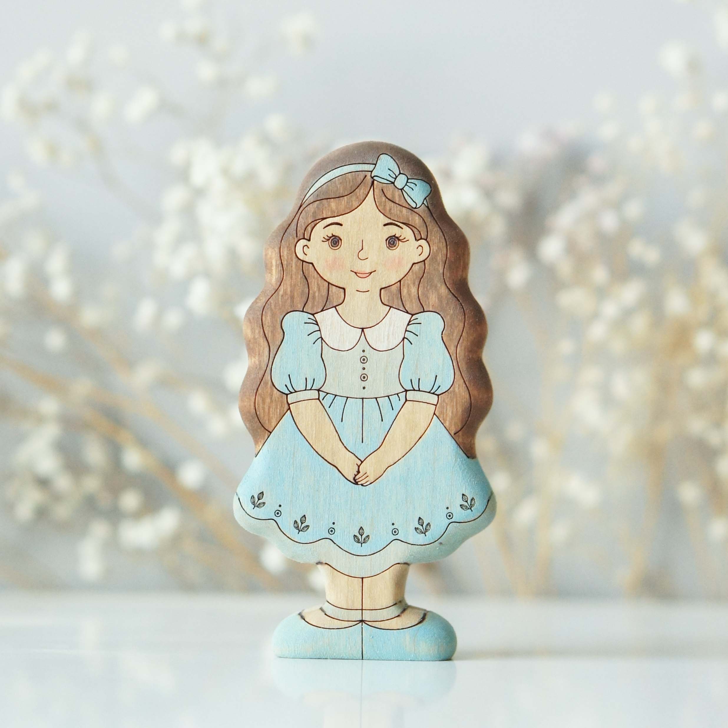 Girl in blue dress - front view