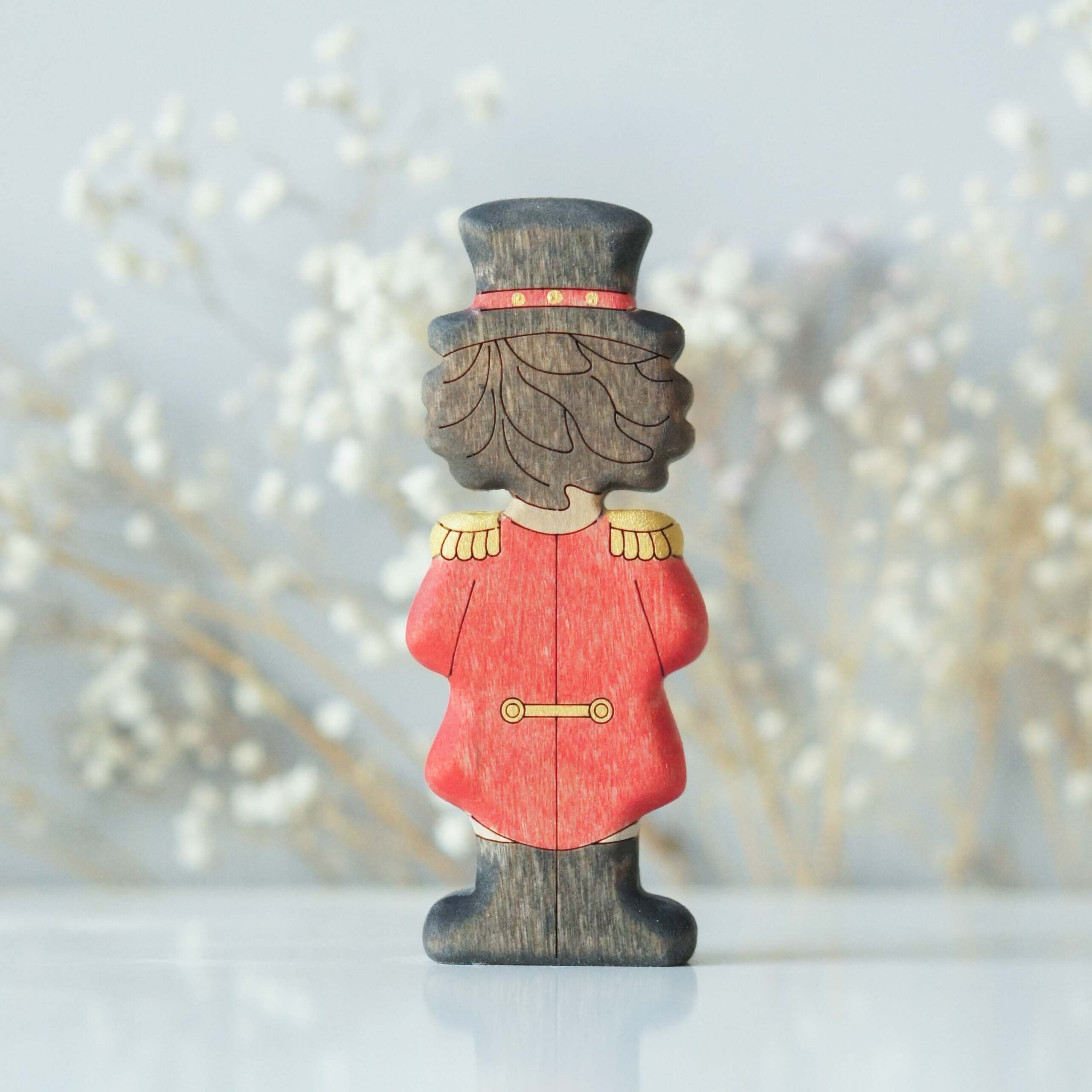 Man in red coat - back view