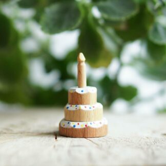 Cake with sprinkles and with candle