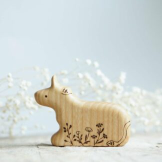 Wooden cow (lying ) toy natural