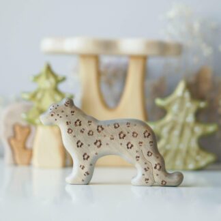 Wooden snow leopard toy painted (with sparkle)
