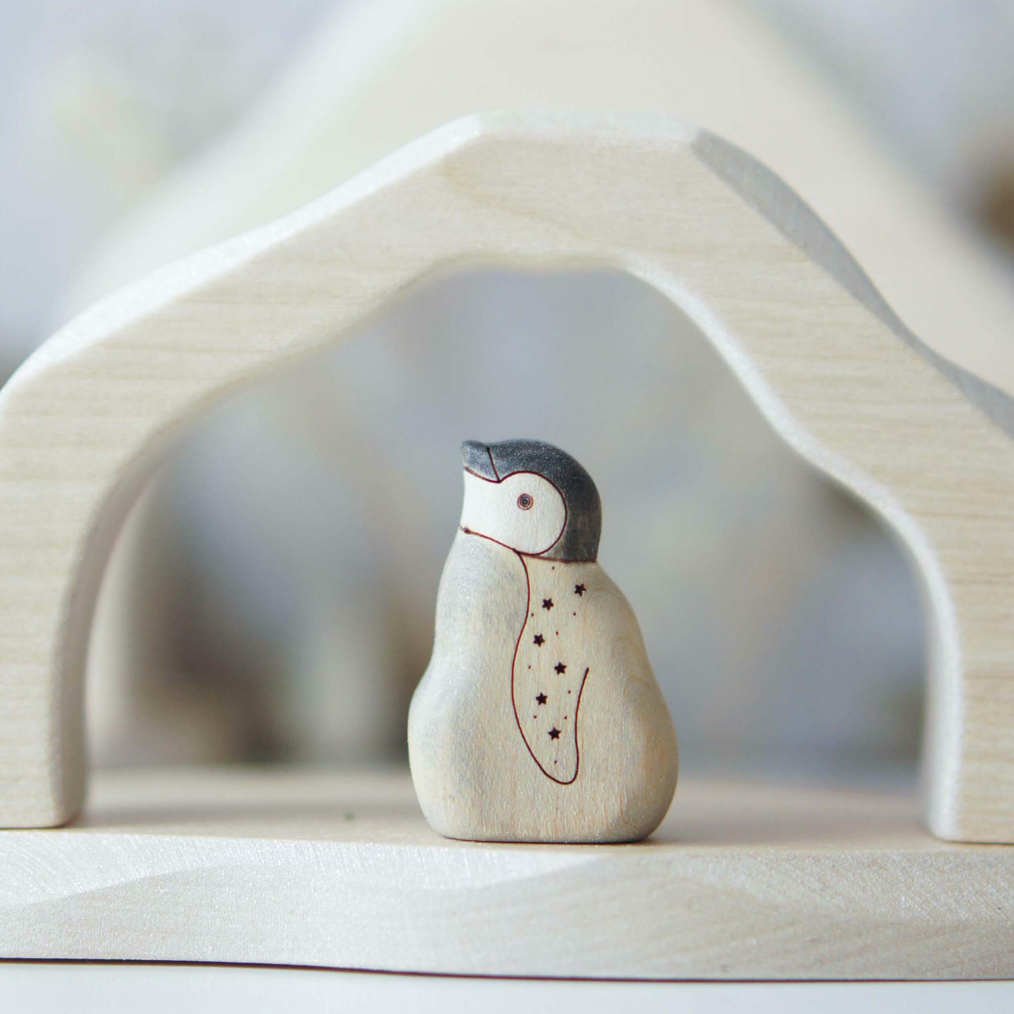 Penguin baby looks up toy (painted) (with sparkle)